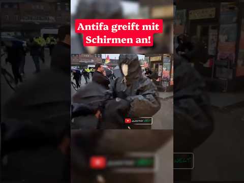 Antifa greift mich mit Schirmen in Berlin an